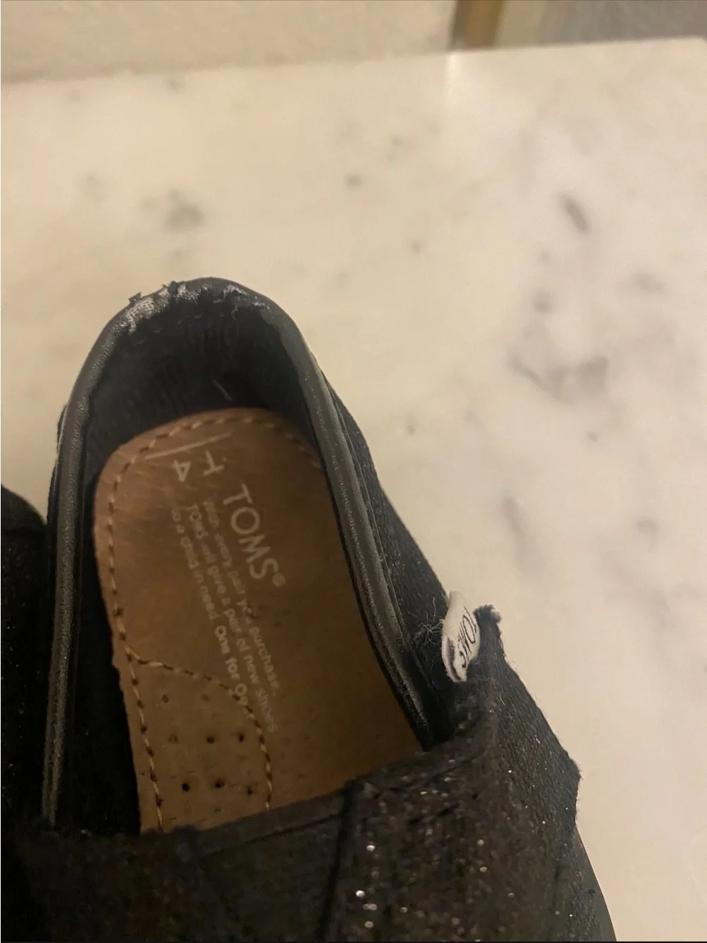 TOMS Kids Glitter Slip-On Shoes in Black